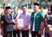 Hari Bhayangkara, Ketua PWI Meranti Terima Penghargaan atas Dedikasi Jaga Independensi Pers